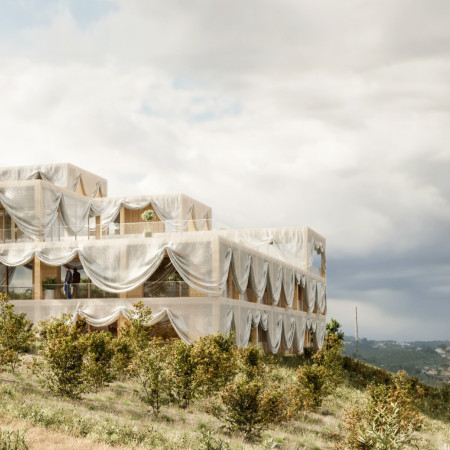 Translucent Metal Curtains and Warm Pine Create Inviting Communal Spaces in Residential Development