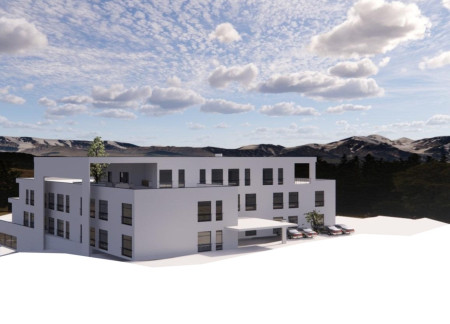 Charred Wooden Shingles and Natural Light in a Community-Centric Senior Residence