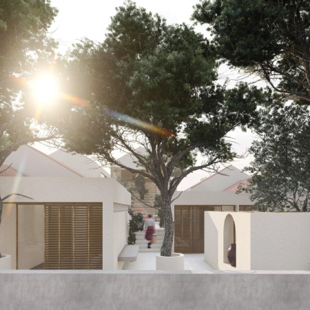 Rammed Earth and Cork Integration in a Community-Centric Guest House