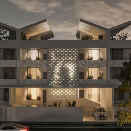 Central Courtyard with Solar Panels Enhances Sustainable Living in Contemporary Family Home