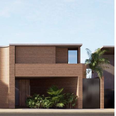 Rammed Earth Structure with Central Courtyard Enhances Community Interaction Through Natural Materials