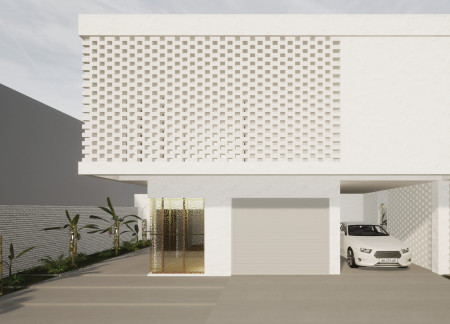 Perforated Brass Facade and Clay Block Design for Sustainable Family Living