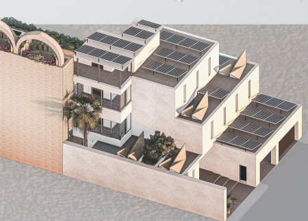 Natural Brown Mud Blocks and Perforated Screens Define a Community-Focused Courtyard Residence