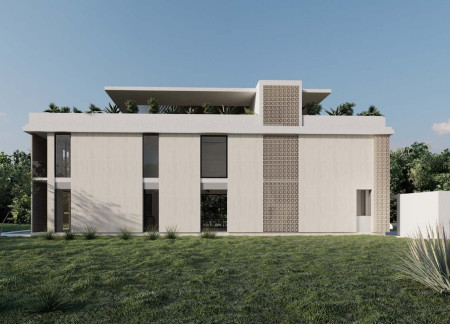 Perforated Screens and Natural Stone Define a Contemporary Residential Retreat