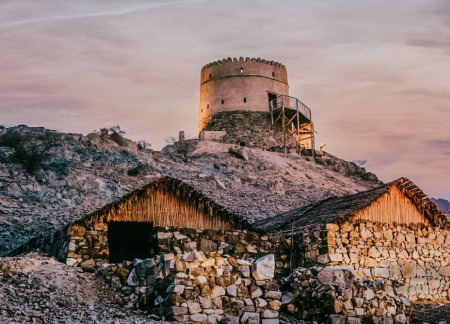 Charred Wooden Shingles and Concrete Forms in a Sustainable Hatta Residential Space