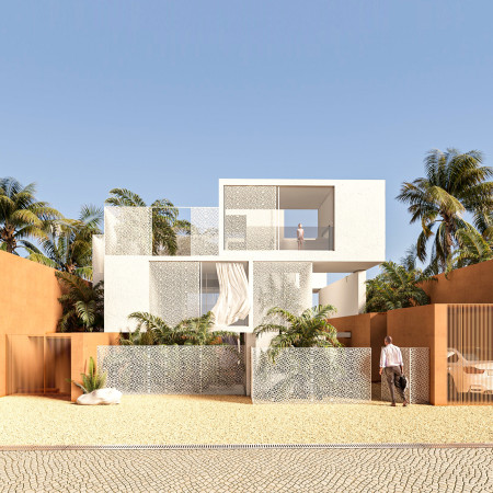 Charred Wooden Shingles and Cross-Ventilated Spaces in a Desert Home