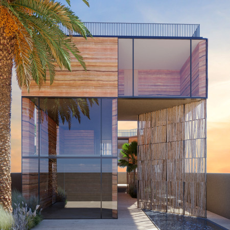 Rammed Earth and Wind Catchers Harmonize in Sustainable Family Living Spaces