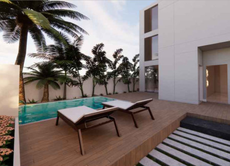 Charred Wooden Shingles and Expansive Windows in a Sustainable Residential Design