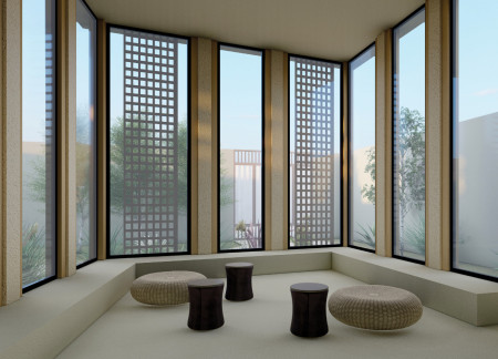 Raw Earth Construction with Traditional Wind Towers in a Community-Oriented Residence