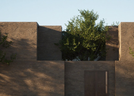 Rammed Earth Residence Featuring Climate-Responsive Atrium Design and Natural Ventilation