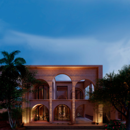 Courtyard Home Emphasizing Mud Brick and Natural Stone for Sustainable Living