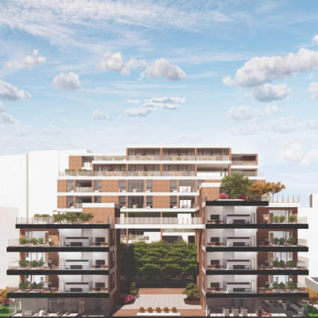 Charred Wooden Shingles and Natural Ventilation in a Community-Centric Housing Development