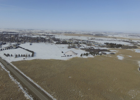 Spiral Landscape Mound Crafted from Recycled Concrete and Native Stone for Community Engagement