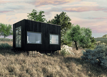 Charred Wood Enclosure Embraces Sustainable Living in a Compact Tuscan Nest