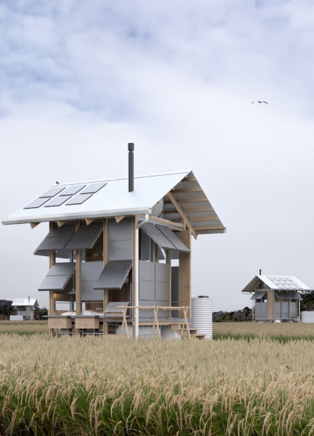 Elevated Rice Farming Huts Crafted from Reclaimed Timber and Charred Shingles