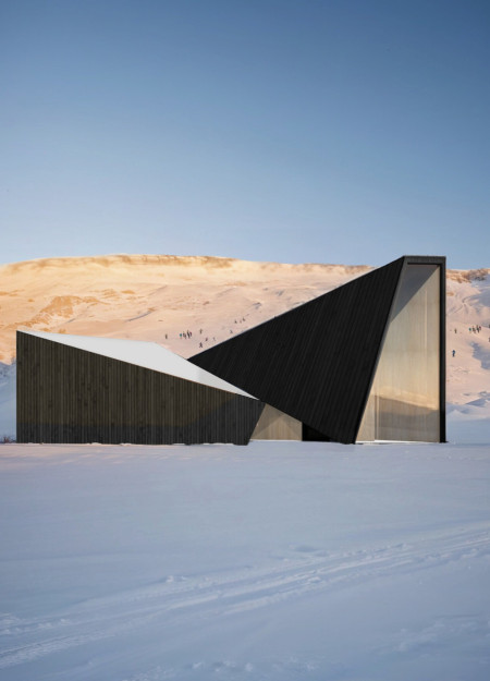 Employing Corrugated Wood Cladding and Angular Forms to Create a Seamless Connection to Mountain Landscapes