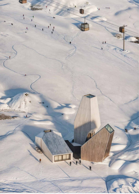 Charred Wooden Shingles and Expansive Glazing Creating Symbiosis with Icelandic Landscape