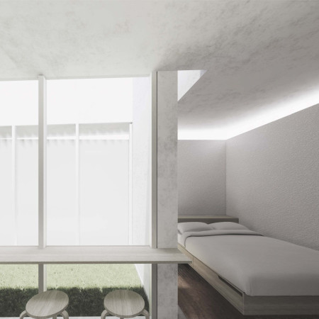 Courtyard Residence Embracing Natural Light with Concrete and Charred Shingles