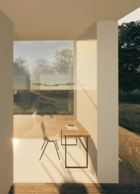 Water-Focused Atrium in Concrete and Glass Amidst Natural Landscapes