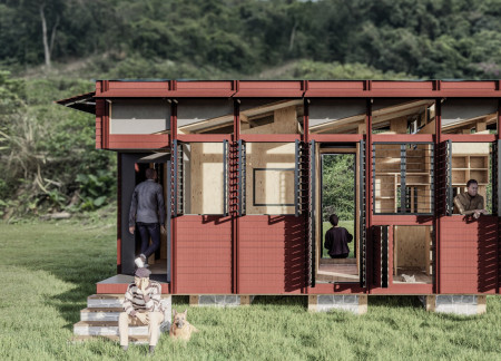 Charred Wooden Shingles and Composite Wood Cladding in a Seamless Indoor-Outdoor Living Space
