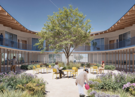 Curved Design Featuring Gabled Roof and Natural Wood Elements for Compassionate Care Facility