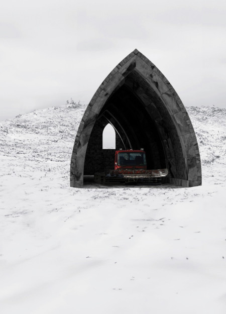 Dark Stone and Glass Shelter Integrated with the Mountainous Terrain
