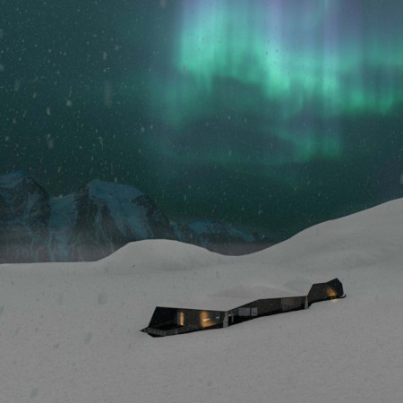 Camouflaged Residence Crafted with Local Basalt and Sustainable Lupine Insulation