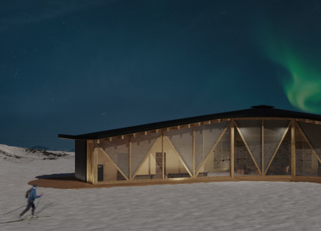 Charred Wooden Shingles and Expansive Glazing in a Ski Cabin Embracing Nature