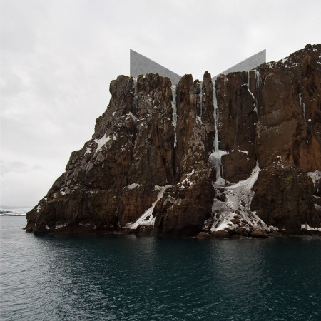Coastal Gallery Featuring Polished Stone and Expansive Glass for Emotional Exploration
