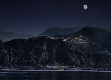 Charred Wood Shingles and Natural Stone Create Harmonious Microhomes in a Mediterranean Landscape