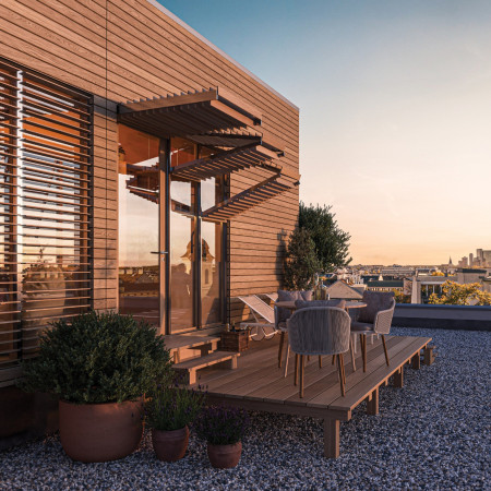 Charred Wood Facade and Modular Design Transforming Urban Rooftops into Functional Living Spaces