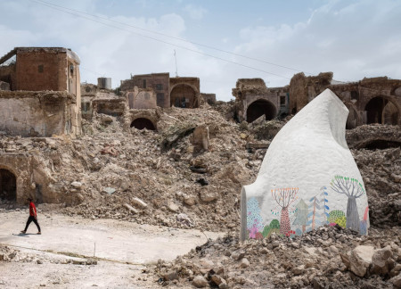 Repurposed Rubble and Curvilinear Forms in Sustainable Community Living