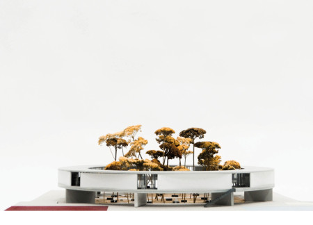 Circular Community Hub Featuring Transparent Facade and Concrete Landscaping