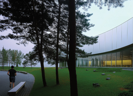 Curvilinear Design with Glass Facades and Therapeutic Gardens for End-of-Life Care