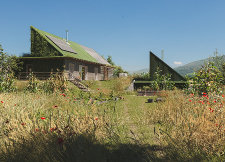 Charred Wooden Shingles and High-Performance Insulation Define Sustainable Living Spaces