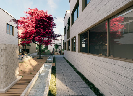 Charred Wooden Shingles and Natural Stone Integrate with Healing Landscapes in Care Facility Design