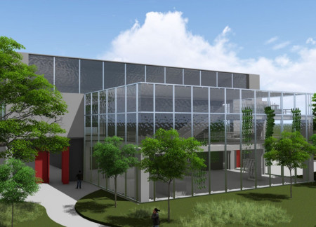 Charred Wooden Shingles and Glass Facade in a Community Learning Hub