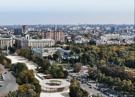 Circular Water Feature Framing Community Engagement with Reinforced Concrete and Glass Elements