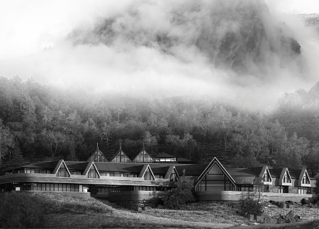 Sustainable Getaway Featuring Local Stone and Sloped Roof Emphasizing Mountain Views