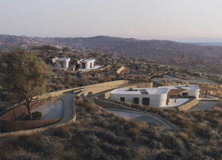 Curved Forms and Local Stone Create Unique Coastal Living Experience