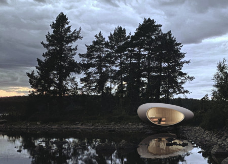 Curved Forms and Natural Stone Create Symbiotic Residential Space with Sustainable Glass Elements