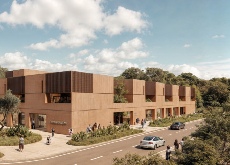 Corten Steel Facades and Green Roofs Enhance Community Living in Sustainable Housing Design