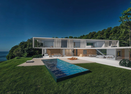 Charred Wooden Shingles Blend with Concrete Structure in Coastal Modular Living