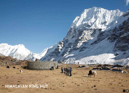 Circular Stone Shelter Featuring Central Hearth and Sustainable Materials in the Himalayas