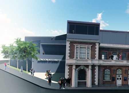 Fluid Formations of Glass and Brick Frames in a Digital Education Hub