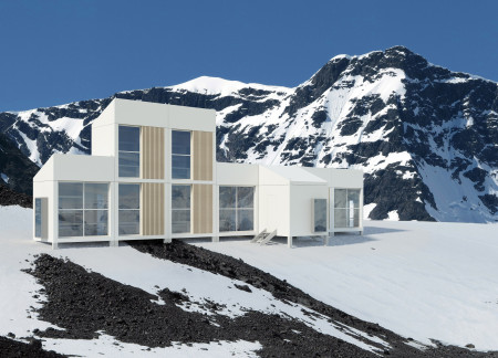 Solar-Powered Cabins with Interlocking Modules and Natural Wood Finishes in the Icelandic Landscape
