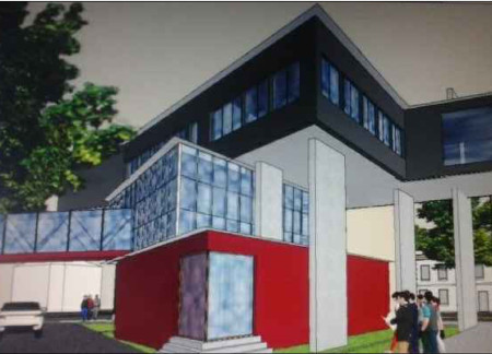 Cantilevered Structure with Exposed Concrete and Glass Facades Enhances Urban Connectivity