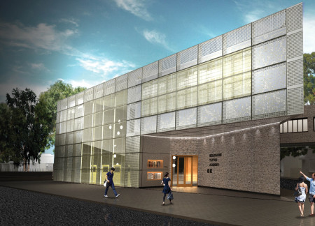 Perforated Aluminum Facade Accompanying Flexible Workshop Spaces in a Community-Centric Learning Facility