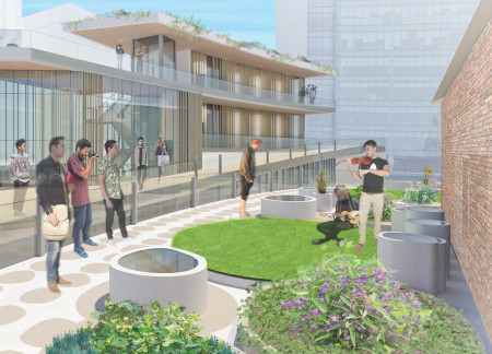 Charred Wooden Shingles and Reclaimed Timber Create a Versatile Community Space