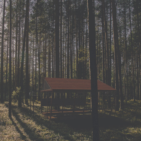 Charred Wooden Shingles and Local Oak Create a Sustainable Retreat in the Latvian Forest
